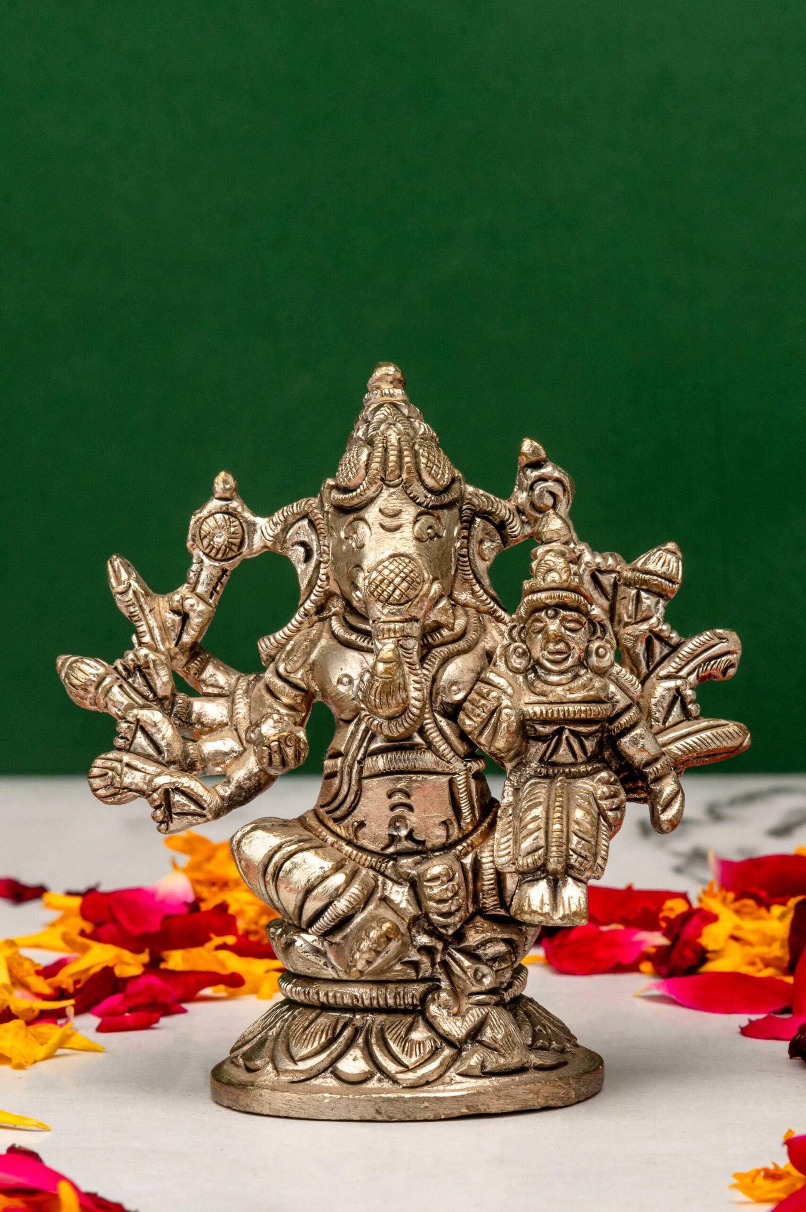 brass-Ganesh-583-8-scaled-1.jpg Brass Silver Coated 10 Bhuja Ganesh Idol with Laxmi – Vighnaharta – 3 Inch - Image 1