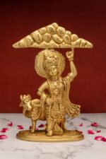 Brass Krishna Idol with Cow and Holding the Mount Govardhan – 10 Inch